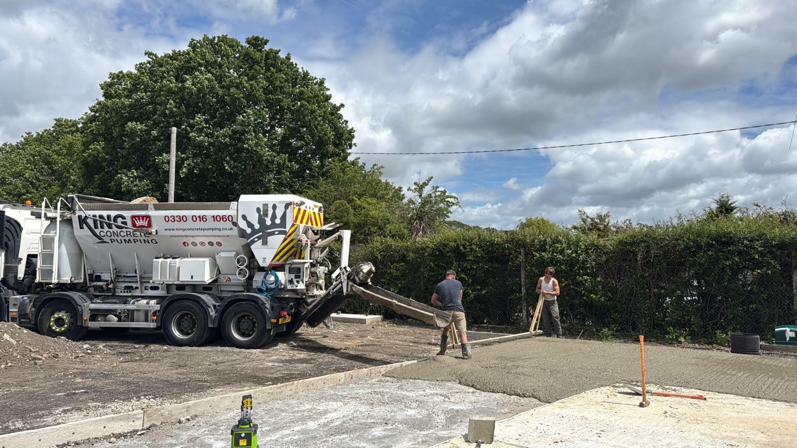 King Concrete Pumping crew placing concrete on a Horsham site